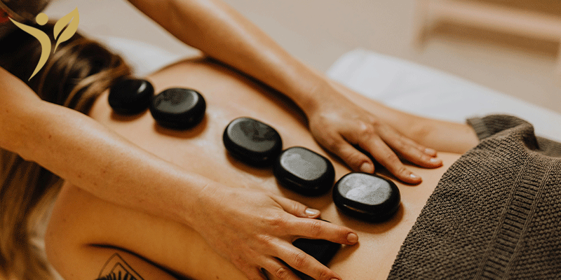 فواید ماساژ سنگ داغ