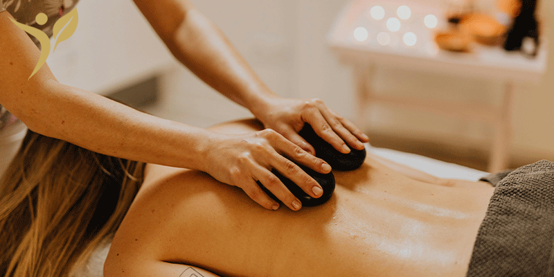 فواید ماساژ سنگ داغ